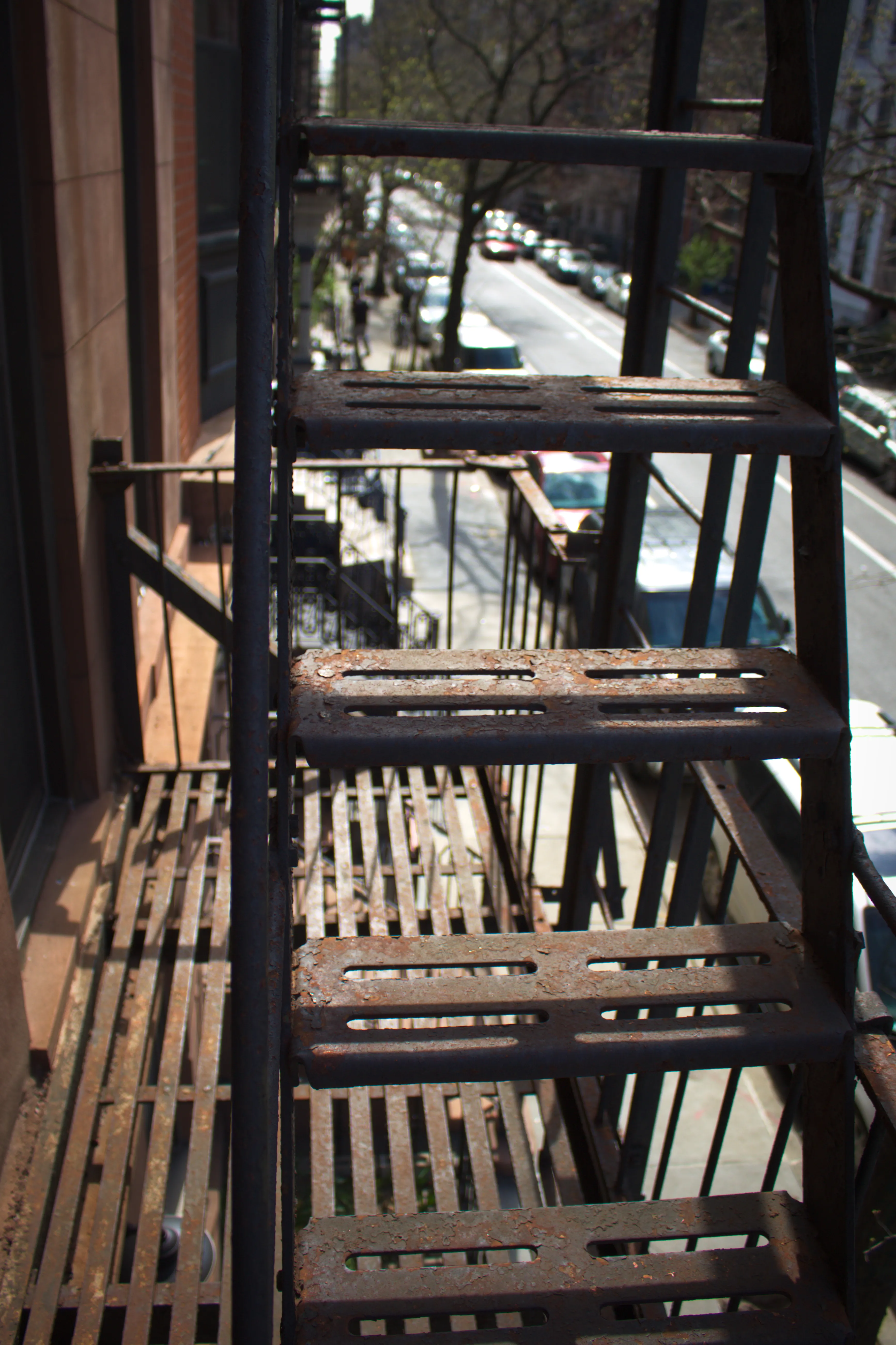 A fire escape ladder on the side of a building